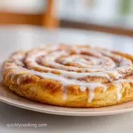 Sweet Cinnamon Swirl Pizza with Vanilla Glaze in 27 Minutes