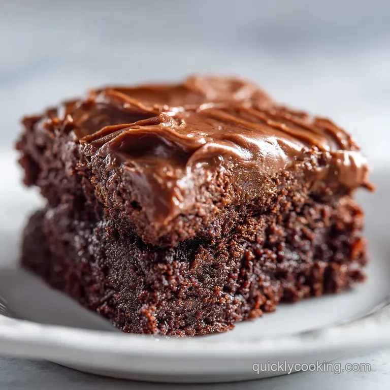Elegant brownie triangles drizzled with dark chocolate, against a creamy swirl of vanilla ice cream and a dusting of cocoa...